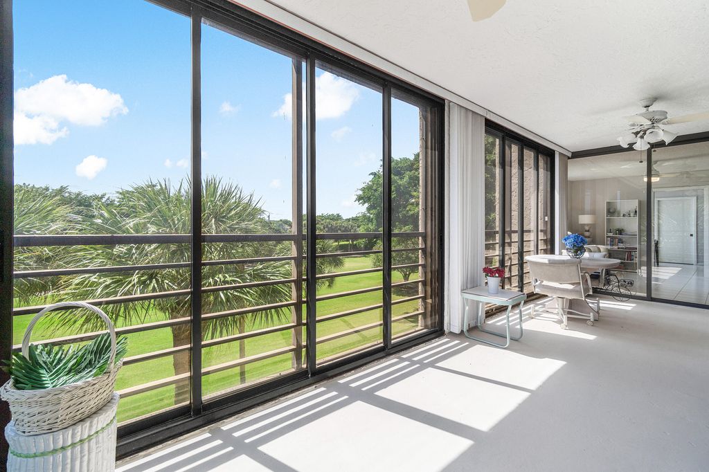 Photo of 7572 Regency Lake Drive #401, Boca Raton, FL 33433 (MLS # R11130039)