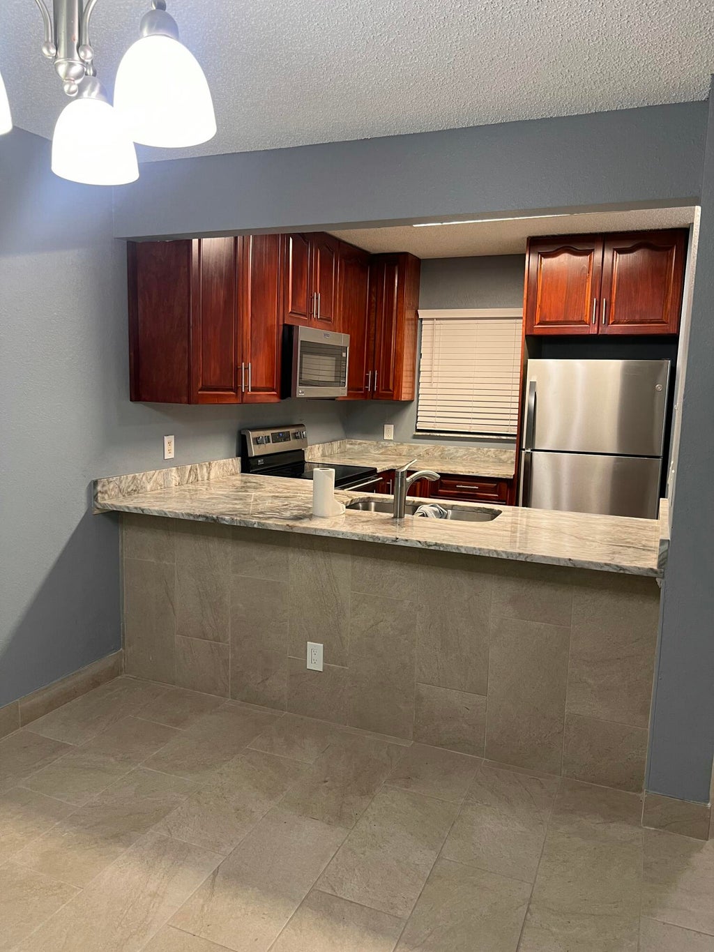 Photo of 1661 E Balfour Point Drive #E, West Palm Beach, FL 33411 (MLS # B26035573)