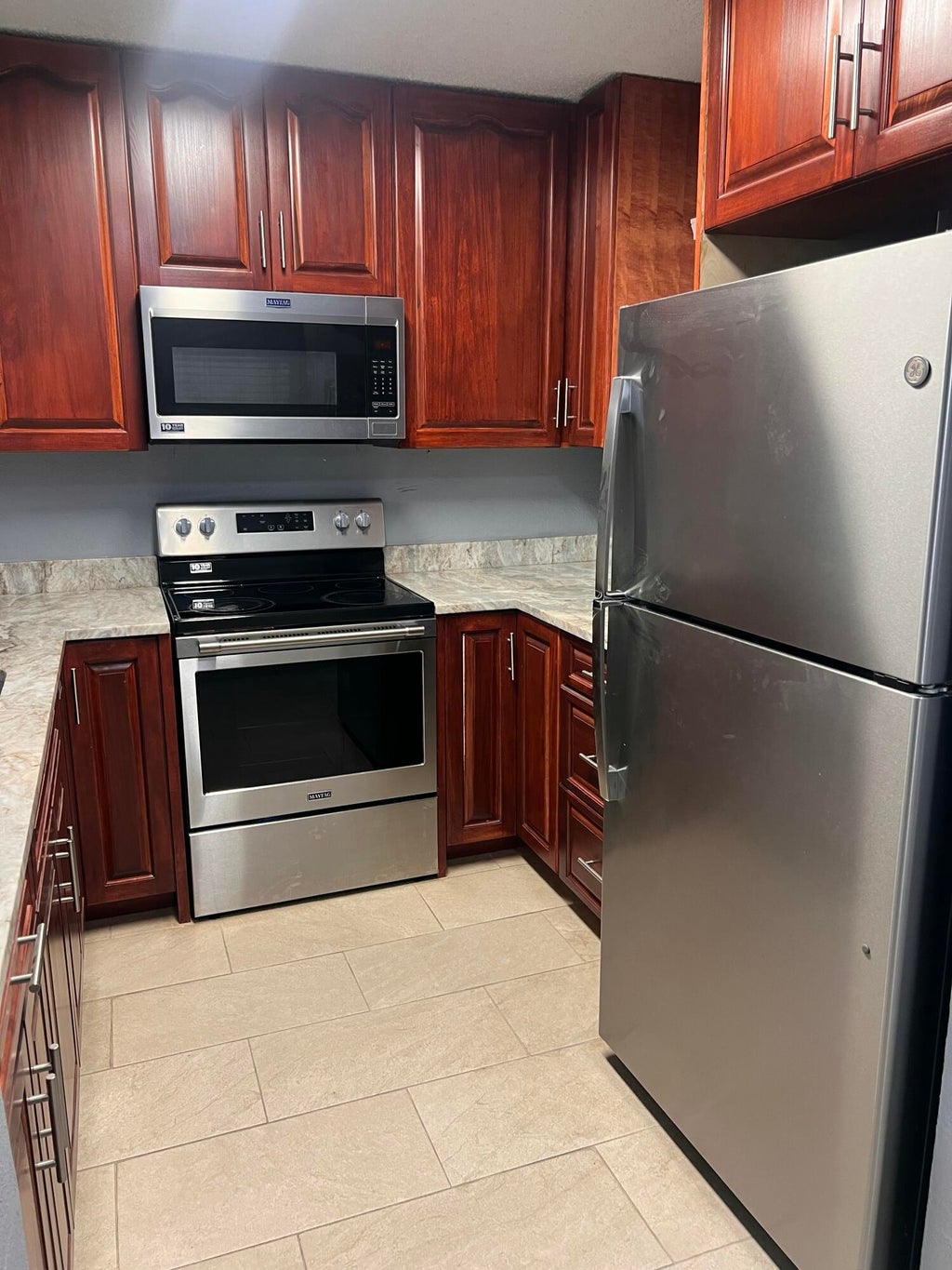 Photo of 1661 E Balfour Point Drive #E, West Palm Beach, FL 33411 (MLS # B26035573)