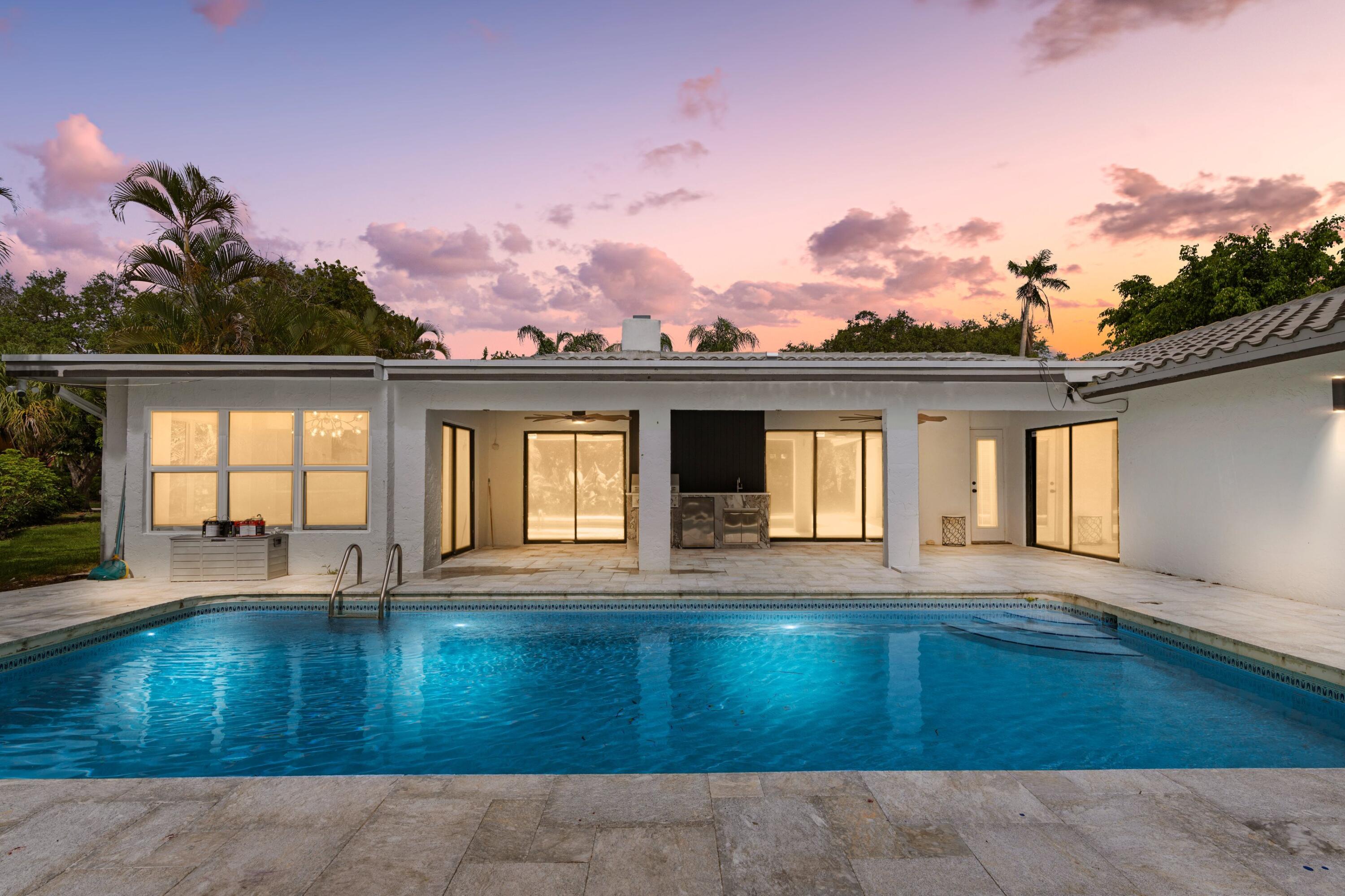 ABSOLUTELY GORGEOUS WATERFRONT ESTATE | BREATHTAKING CANAL VIEWS | PRESTIGIOUS MAPLEWOOD | EXQUISITE HIGH-END QUALITY WORKMENSHIP | Bright Open Floor Plan | Woodburning Fireplace | Dramatic Vaulted Ceilings | Recessed LED Lighting | Custom Fans | Ceramic Tile Floors | Stunning Eat-In Kitchen | Quartz Counters | Tile Backsplash | Center Island & Breakfast Bar | Custom Wine Bar | Immaculate Lush Landscaping | Large Backyard with Custom Built Pool | Covered Patio | Full Outdoor Kitchen | Impressive Primary Suite | Pool Views | Walk-In Closet | Barn Doors | Ensuite | Soaking Tub | Glass Shower | All Hurricane Impact Windows | 2-Car GA & Storage | Great Location to Parks, Fine Dining, Shops & Turnpike | Top A+ Rated Schools | No HOA Fee | ROOF 2024 | AC 2023 | WH 2023 | PRESENT ALL OFFERS