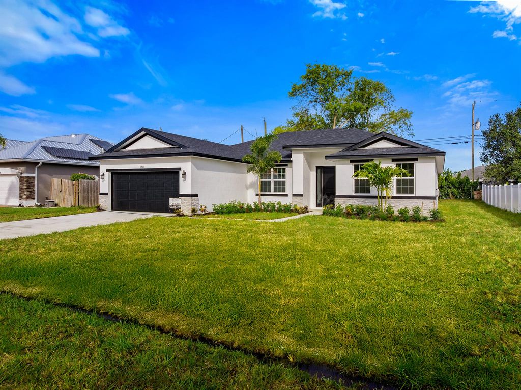 Photo of 1765 SW Columbia Street, Port Saint Lucie, FL 34987 (MLS # R11098552)