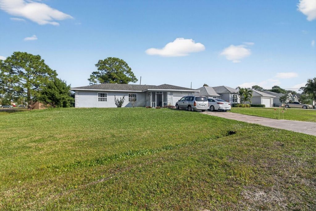 Photo of 1097 SW Majorca Avenue, Port Saint Lucie, FL 34953 (MLS # F10539985)