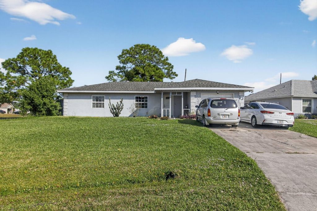 Photo of 1097 SW Majorca Avenue, Port Saint Lucie, FL 34953 (MLS # F10539985)