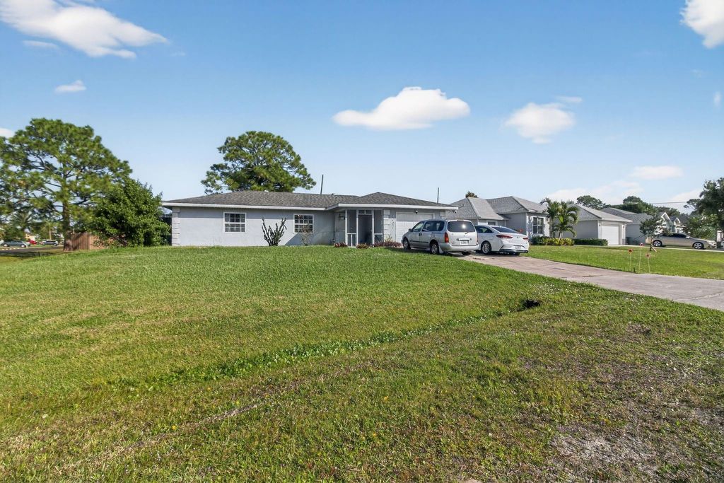 Photo of 1097 SW Majorca Avenue, Port Saint Lucie, FL 34953 (MLS # F10539985)