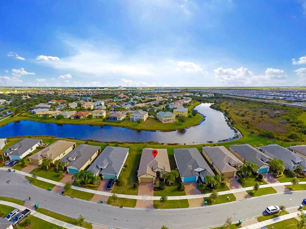 Photo of 11289 SW Lake Park Drive, Port Saint Lucie, FL 34987 (MLS # R10964897)