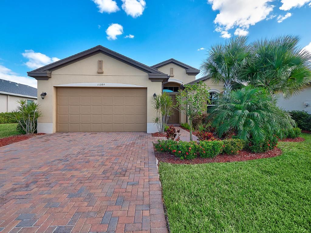 Photo of 11289 SW Lake Park Drive, Port Saint Lucie, FL 34987 (MLS # R10964897)