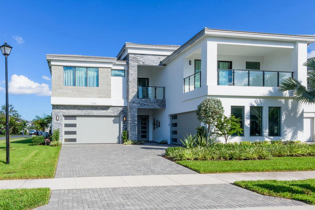 Seller relocating very motivated to sell Price reduced for a fast Sale,Resort Style Lotus Community Boca Raton. Maldives Model Premium corner lot,living space with extensive upgrades. Approximately $200K. first floor Porcelain titles 2nd floor about 5/8 vinyl plank flooring. Home is one year new with builders' warranties., 5 Bedrooms 6 full baths 2 half baths, 4 Car garage, Loft and Media room, Den, 2 Balconies. Modern design collides with resort style amenities inclusive of a clubhouse, restaurant with full menu, fitness center, sports complex, resort pool, tennis courts indoor and outdoor basketball courts, pickleball courts. Gym open 24 hours.Seller has approval to build a pool.See diagram & picture in document