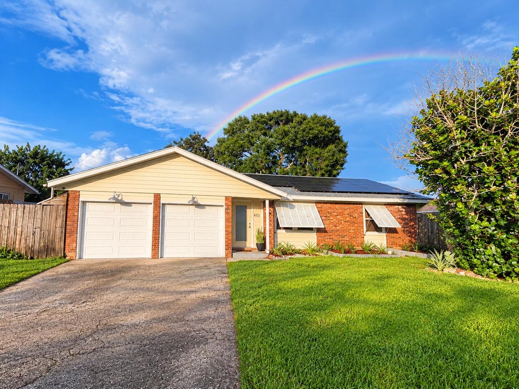 Photo of 453 SE ASBURY Lane, Port Saint Lucie, FL 34983 (MLS # B26079087)