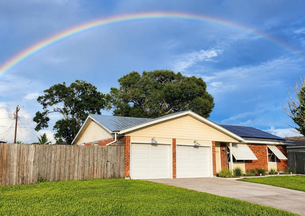 Photo of 453 SE ASBURY Lane, Port Saint Lucie, FL 34983 (MLS # B26079087)