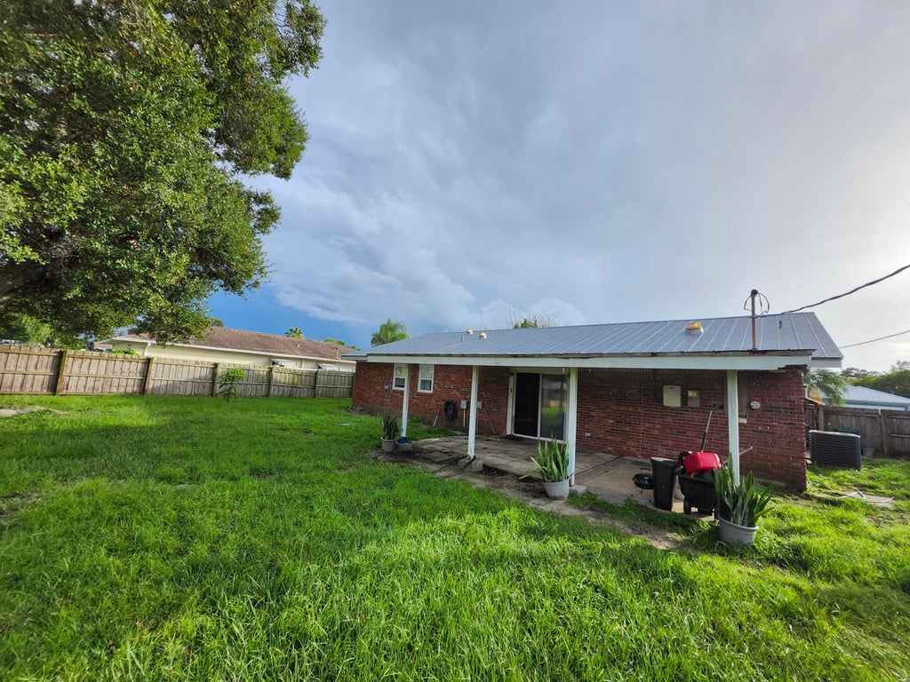 Photo of 453 SE ASBURY Lane, Port Saint Lucie, FL 34983 (MLS # B26079087)
