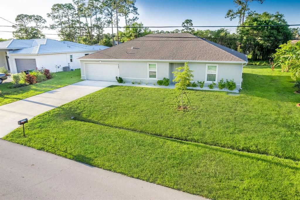 Photo of 1743 SW Bellevue Avenue, Port St Lucie, FL 34953 (MLS # R10883470)