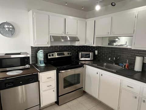 Photo of 114 Waterford E Cir #114, Delray Beach, FL 33446 (MLS # B26022246)