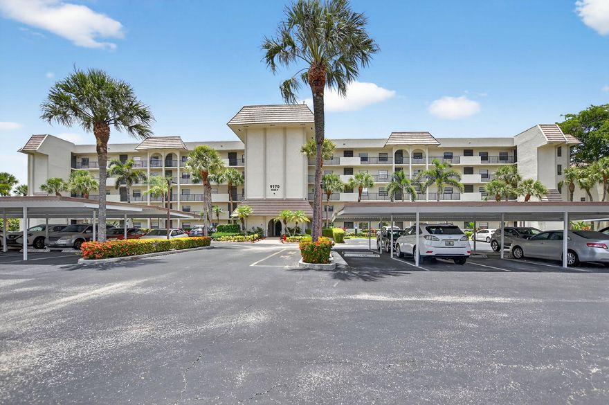 Enjoy easy first-floor access in this spacious 2BR/2BA condo featuring a large enclosed Florida room with expansive garden views. The updated kitchen offers granite countertops, white cabinetry, stainless steel appliances, and a convenient pass-through to the dining area. Bright, open floor plan with tile flooring in main areas and carpet/laminate in bedrooms. The generous primary suite includes excellent closet space and a bath with double sinks and a walk-in shower. The Patios offers 2 pools, spas, tennis, fitness room, game and billiard rooms. Community passed Milestone and SIRS studies with strong reserves and structural integrity. New hurricane-rated foam roofs add long-term value.