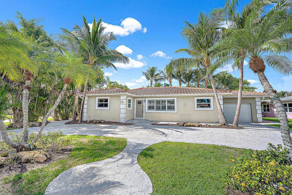 Photo of 312 Claremont Lane, Palm Beach Shores, FL 33404 (MLS # R10999961)