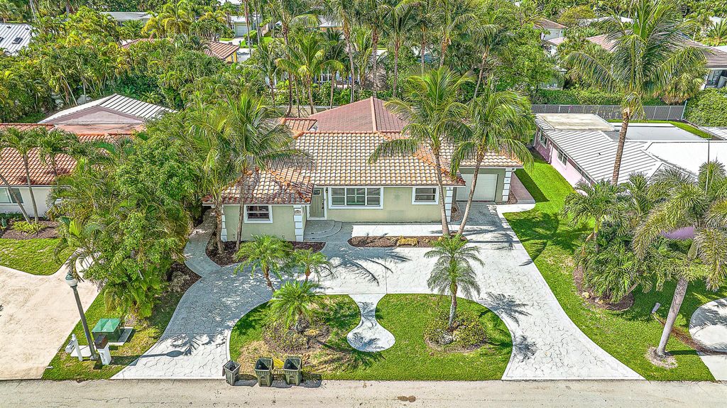 Photo of 312 Claremont Lane, Palm Beach Shores, FL 33404 (MLS # R10999961)
