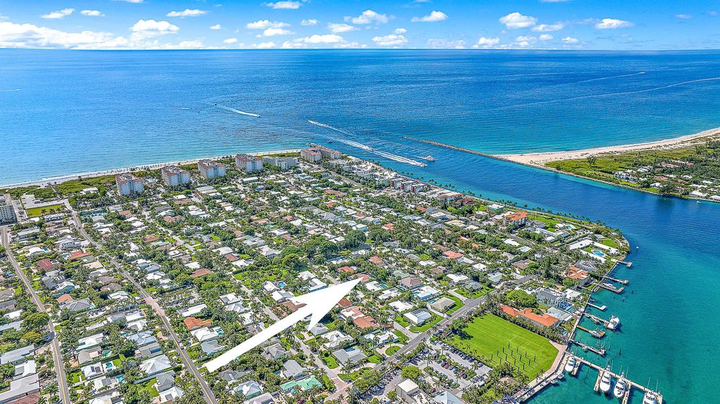 Photo of 312 Claremont Lane, Palm Beach Shores, FL 33404 (MLS # R10999961)