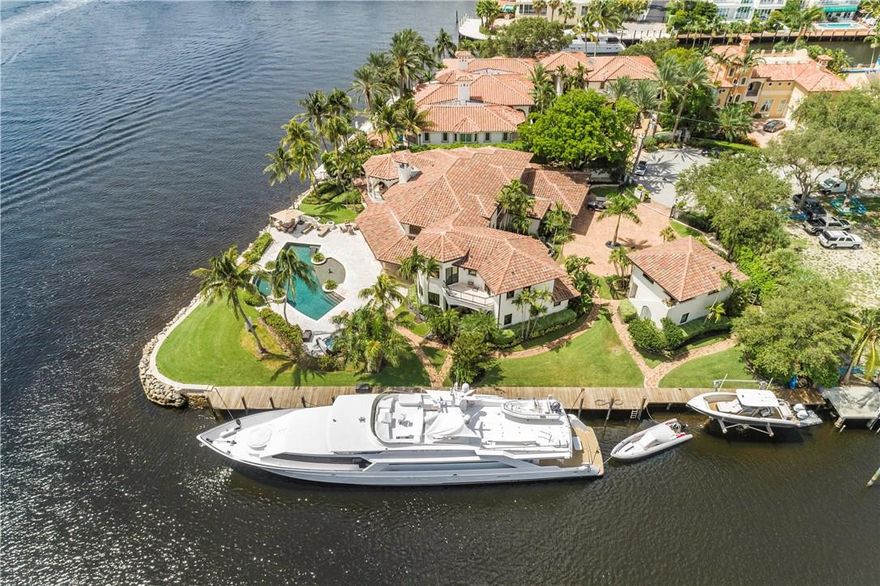 ABSOLUTE AUCTION WITHOUT RESERVE by DeCaro Auctions Int'l on Sat. January 19, 2019 at 11am EST. Live, On-Site No Reserve, Absolute Auction will be sold to the highest bidder.Exquisite point lot estate, +/- 375' of total water frontage, +/-210' of side mega yacht dockage~no wake, 18,000 lb boat lift. Spectacular Intracoastal views! Bright, open floor plan, chef's kitchen opens to family room, elegant formal areas, ultra luxurious master suite w/dual closets and water closets, office. 2 gas fireplaces, separate guest house. Lovely loggias and balconies. Incredible resort style salt water pool, outdoor sound system, lush landscaping. New impact doors & windows, generator.