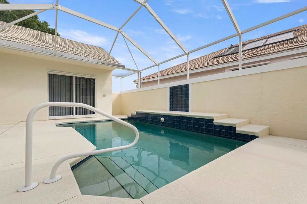 Photo of 626 SW Lake Charles Circle, Port Saint Lucie, FL 34986 (MLS # R11126168)