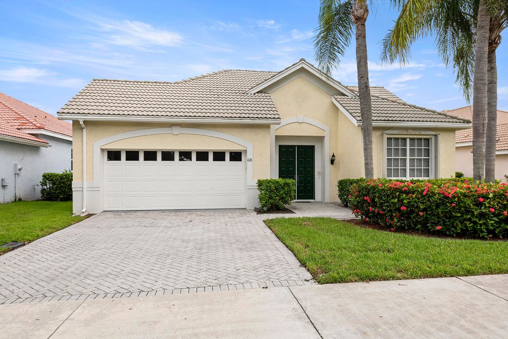 Photo of 626 SW Lake Charles Circle, Port Saint Lucie, FL 34986 (MLS # R11126168)