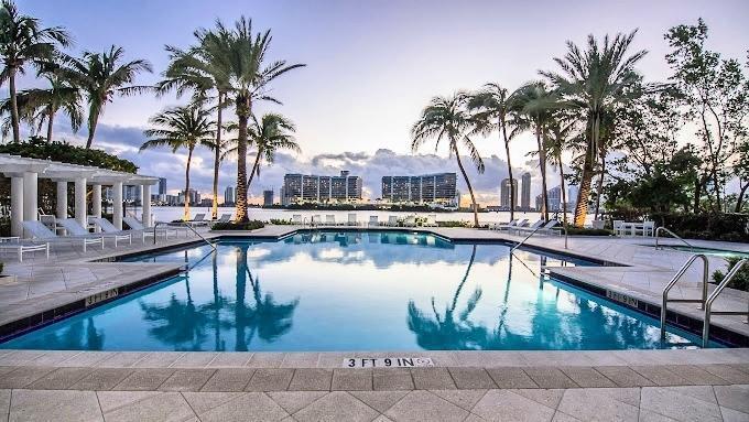 Stunning waterfront unit with unobstructed intracoastal views! Largest 2 bed/ 2 bath split floor unit in the only building on the Bay within 24 /7 gated Mediterranean Resort Style community in heart of Aventura. Unit has tile floors throughout, large walk-in closets, open kitchen and full-sized washer and dryer. Community boasts bayfront heated pool, BBQ area and 2 lighted tennis courts. Clubhouse includes a state-of-the-art gym, yoga/pilates room, theater and party room. Less than 10 minutes from Aventura Mall and beach, walk to shopping, restaurants and parks. Water and cable included. Community recently installed new roofs and completed exterior building painting; EV charging stations coming soon.