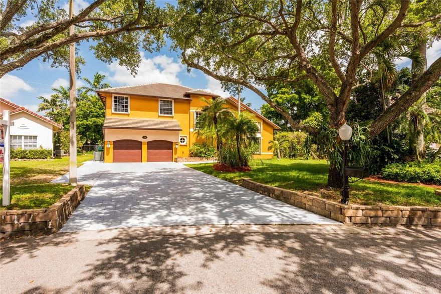 WANT ONE OF THE BIGGEST YARDS IN ROCK CREEK? THIS IS IT! KIDS WILL ABSOLUTELY LOVE IT. MUST SEE ALL THE PICTURES & THEN THIS HOME IMMEDIATELY. 33X19 SOLAR HEATED POOL WITH 67X27 PATIO/POOL AREA +2 OTHER PATIO AREAS. GREAT HOME FOR ENTERTAINING W/LOTS OF OUTDOOR LIGHTING FOR NIGHT TIME PARTIES AS WELL. CUSTOM TIKI HUT W/ELECTRIC. BEAUTIFULLY REMODELED BIG KITCHEN W/GRANITE COUNTERS/42" CABINETS/2 SNACK BARS/PLUS SO MUCH MORE/OPEN TO FAMILY RM. 10X10 BREAKFAST AREA NEXT TO KITCHEN. DINING ROOM W/BREAKFRONT & BAR+WINE FRIG. OVERSIZED LIVING ROOM. TRUE 5 BEDROOM-1 ON 1ST FLOOR. BIG 21X14 MASTER BEDROOM & MASTER BATH W/JACUZZI TUB/SEPARATE SHOWER. 24X24 RECTIFIED PORCELAIN FLOORS IN LIVING AREAS. NEW ROOF 2018. 2 AC'S 2010. 160 GALLON SOLAR WATER HEATER. GARAGE DOOR HURRICANE RATED. ACCORDIONS.