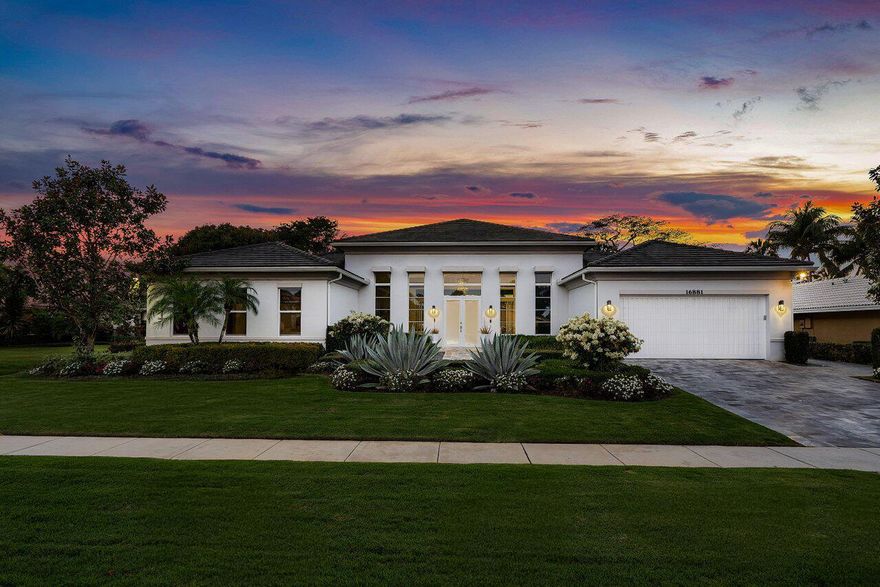 Tucked away on a serene cul-de-sac in the prestigious, award-winning Delaire Country Club, this model-perfect custom estate offers a rare combination of elegance, comfort, and cutting-edge efficiency. Showcasing breathtaking lake and golf course views along the entire western exposure, this 4-bedroom residence is a masterpiece of design and detail. Step into a thoughtfully crafted open floor plan that seamlessly blends luxury and functionality. The heart of the home is a gourmet designer kitchen featuring sleek quartz and granite countertops, premium Thermador stainless steel appliances, and smart home technology that puts comfort at your fingertips. Throughout the home, you'll find exquisite finishes including rich hardwood, porcelain, and plush carpet flooring, complemented by solid