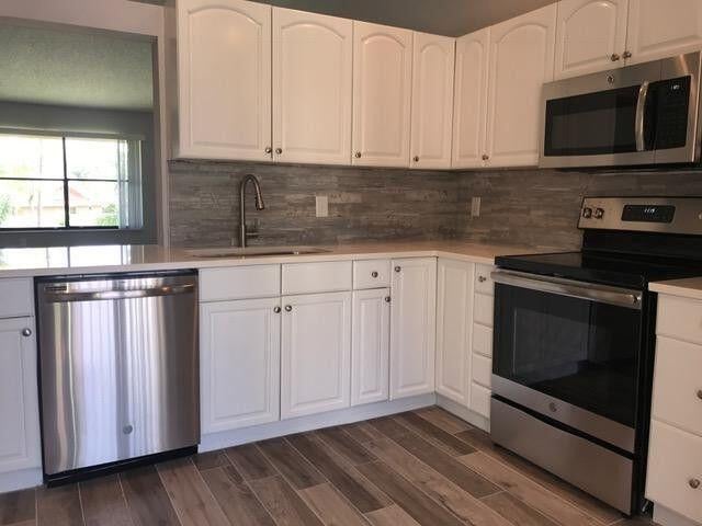 Photo of 13025 Northshire Trail #12, Wellington, FL 33414 (MLS # B26077636)