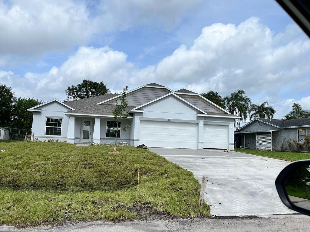 Photo of 209 SW Christmas Terrace, Port Saint Lucie, FL 34984 (MLS # R11099334)
