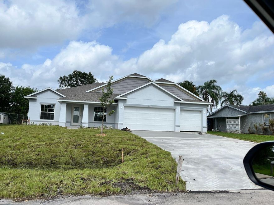 Take advantage of seller-paid concessions! Great opportunity! Schedule your private tour!Welcome to your next home, a spacious four-bedroom plus Den that could easily be used as an additional bedroom, three-bathroom dream home nestled in a peaceful Port St. Lucie neighborhood. This single-family residence offers both comfort and functionality, with ample living space designed for everyday life and special gatherings. The inviting and open concept is perfect for entertaining. There are 2 primary bedrooms each featuring an en-suite bathroom, ensuring a private and relaxing space. Two additional bedrooms provide plenty of options for family, guests, or a home office. The three full bathrooms mean no one has to wait their turn in the morning hustle. Car enthusiasts, hobbyists, or bigg