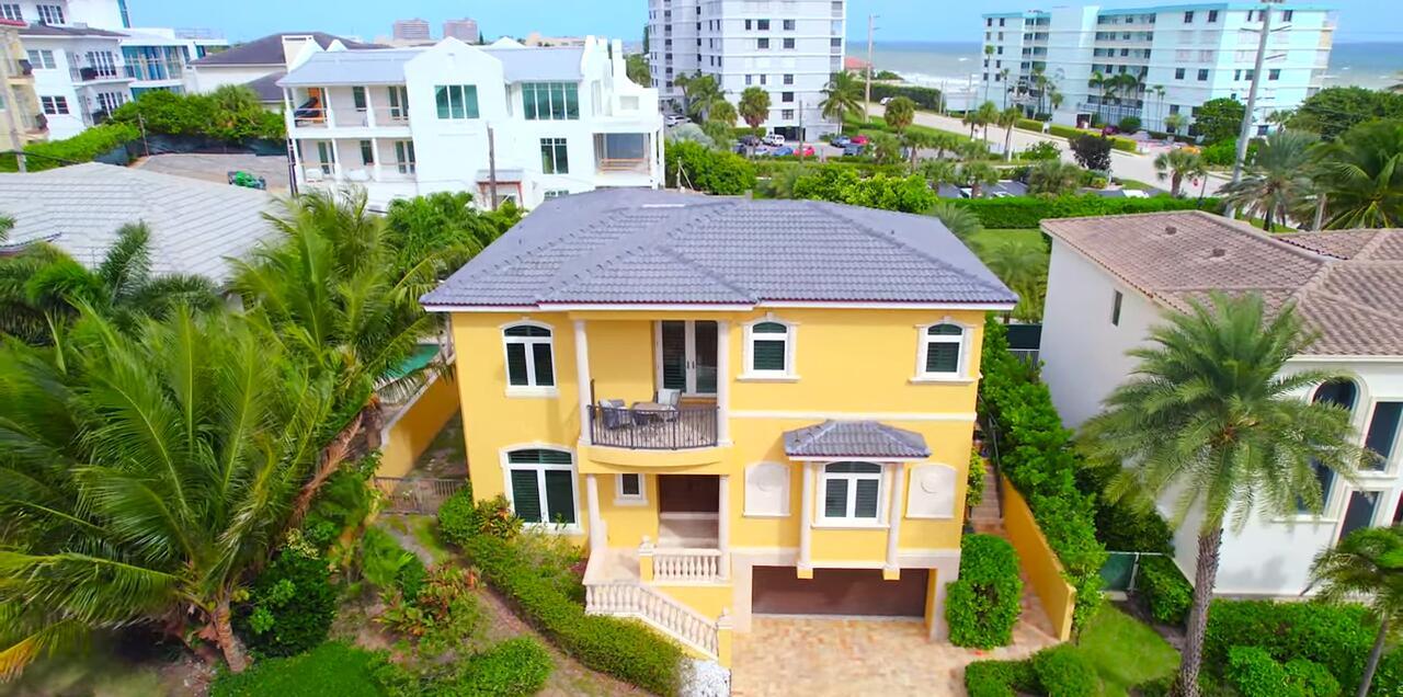 Nestled in the exclusive beachfront community of Surfside Hills in Juno Beach, this stunning custom-built beach house offers luxurious coastal living steps to the beach. Available as a furnished annual rental, this four bedroom, each with its own ensuite bath, plus a convenient half bath, home is perfect for both relaxation and entertaining. Step inside the formal marble foyer to be greeted by a grand wrought-iron staircase and a spacious dining room, ideal for hosting elegant gatherings. The new custom kitchen features brand new Cafe appliances, sleek white quartz countertops, and custom cabinets, providing a perfect blend of style and functionality. SEE MORE...
