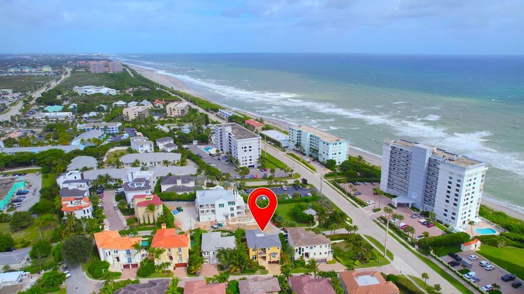 Photo of 451 Surfside Lane, Juno Beach, FL 33408 (MLS # R11099476)