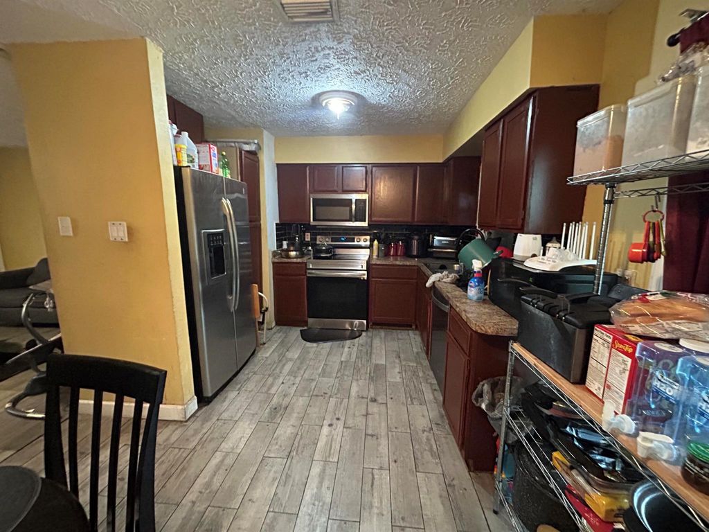 Photo of 213 SW Chapman Avenue, Port Saint Lucie, FL 34953 (MLS # R11090485)