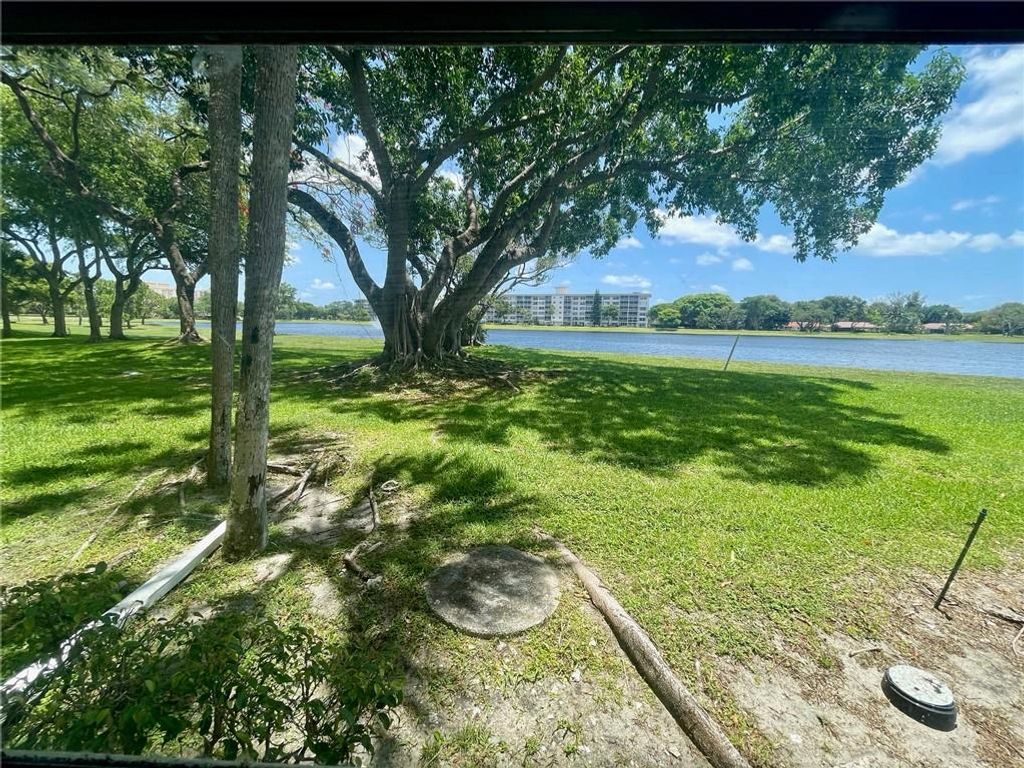 Photo of 2940 N Course Dr #102, Pompano Beach, FL 33069 (MLS # F10285849)