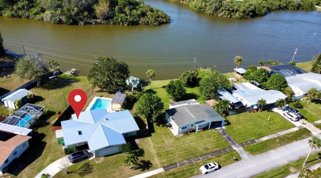 Photo of 886 Schumann Drive, Sebastian, FL 32958 (MLS # R11001208)