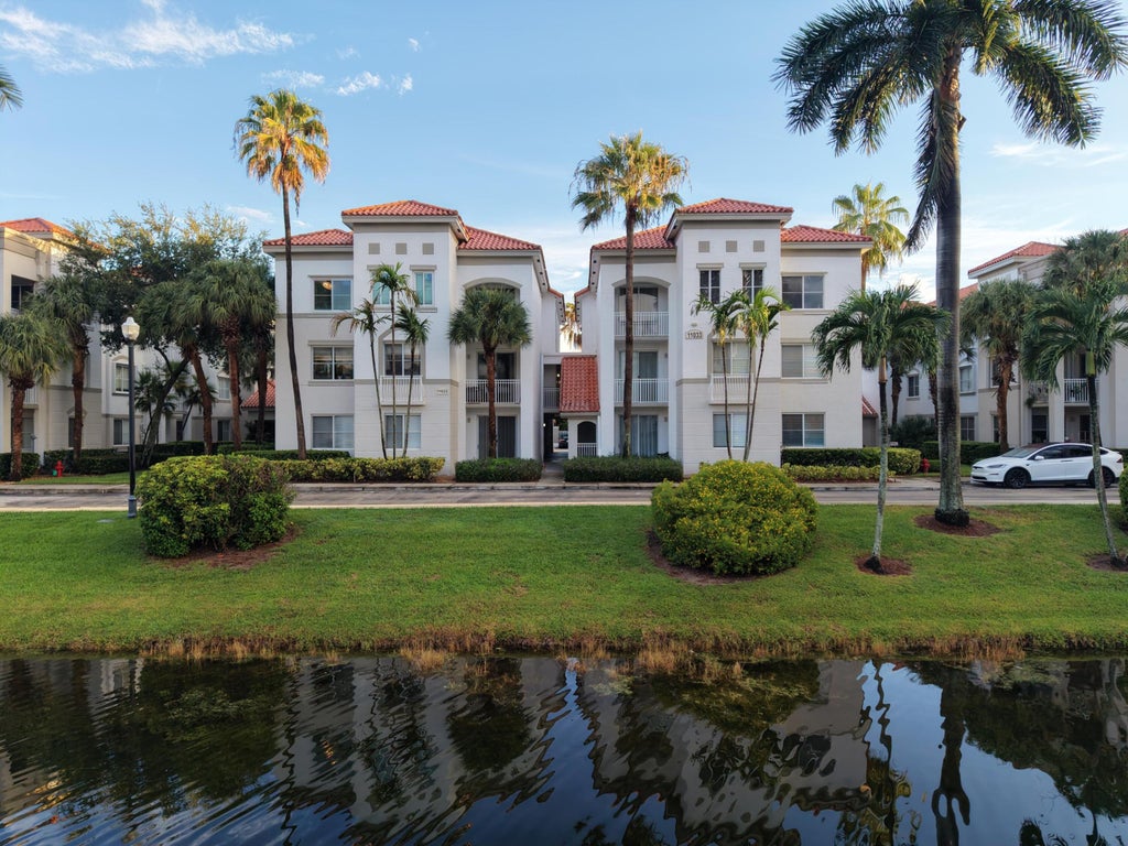Photo of 11033 LEGACY Boulevard #104, Palm Beach Gardens, FL 33410 (MLS # B26075210)
