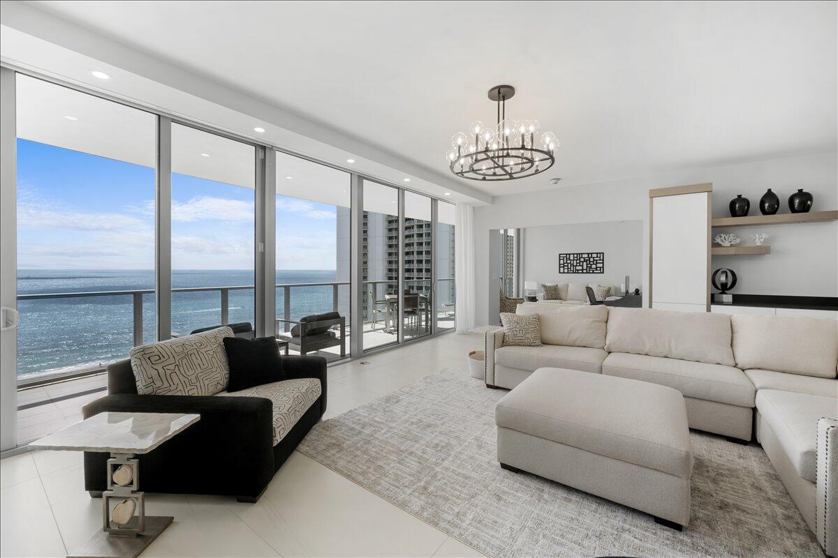 Enjoy ocean views from every room in this 2,200 SF bedroom + den! Located on the 19th floor, this residence is the highest floor available aside from Penthouse. This East facing residence awards beautiful oceanfront sunrises and stays cooler during the summer months. The primary suite has an oversized walk-in closet and the secondary suite is a junior primary features a dual vanity and two closets as well. The Den can easily be used as a flex space to accommodate additional guests on the pull out sofa, and features a full bathroom and closet. Amrit is a resort style community offering over 100,000 SF of amenities to its guests, including two pools, a hot tub, beach service, spa and on-site dining options.