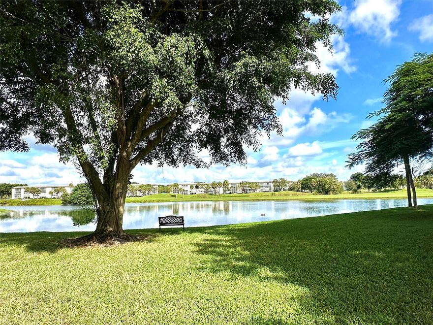 Beautiful water views! Nicely updated condo features an open floor plan for today's style of living. Fully remodeled kitchen with center island open to living/dining area. Granite counter tops & backsplash, custom wood cabinets, wine rack, SS appliances. Direct water views from large enclosed & screened balcony. Updated en-suite bathroom & updated 1/2 bath. Plenty of closets & storage. This unit is furnished & move-in ready! Wynmoor is a very active 55+ gated community with golf course, resort-style amenities including Tennis, Fitness center, pickle ball, multiple Pools & spas, clubhouse with social & game rooms, Bistro, Theater, fitness trail, tons of greenspace & picnic areas! Cable & water are included in the low monthly maintenance of $452. Minimum income requirements apply. PET POLICY-Wynmoor is a no pet community. Only approved service animals and emotional support animalspermitted. Buyers must include all paperwork, including a letter from the appropriatemedical professional, shot records and a photograph of the animal if they are seeking approval of a service animaland emotional support animal.