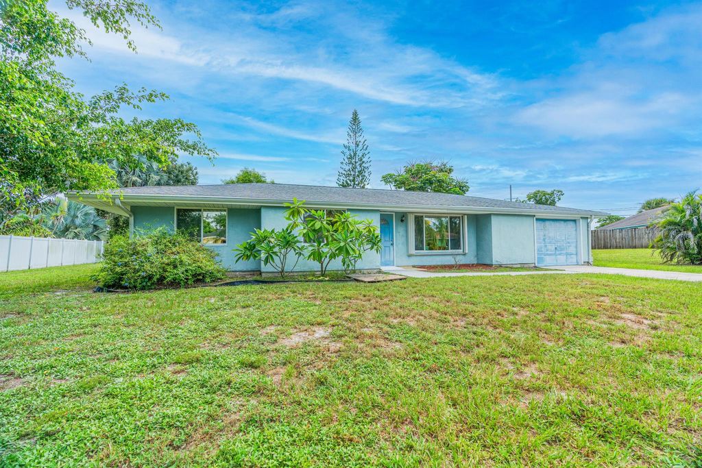 Photo of 150 NE Lima Court, Port Saint Lucie, FL 34983 (MLS # R11015723)