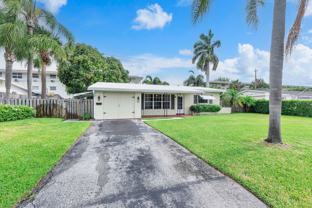 Photo of 1101 NE 35th Street, Pompano Beach, FL 33064 (MLS # B26040978)