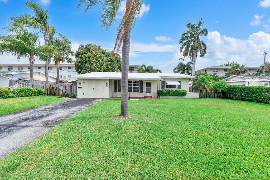 Photo of 1101 NE 35th Street, Pompano Beach, FL 33064 (MLS # B26040978)