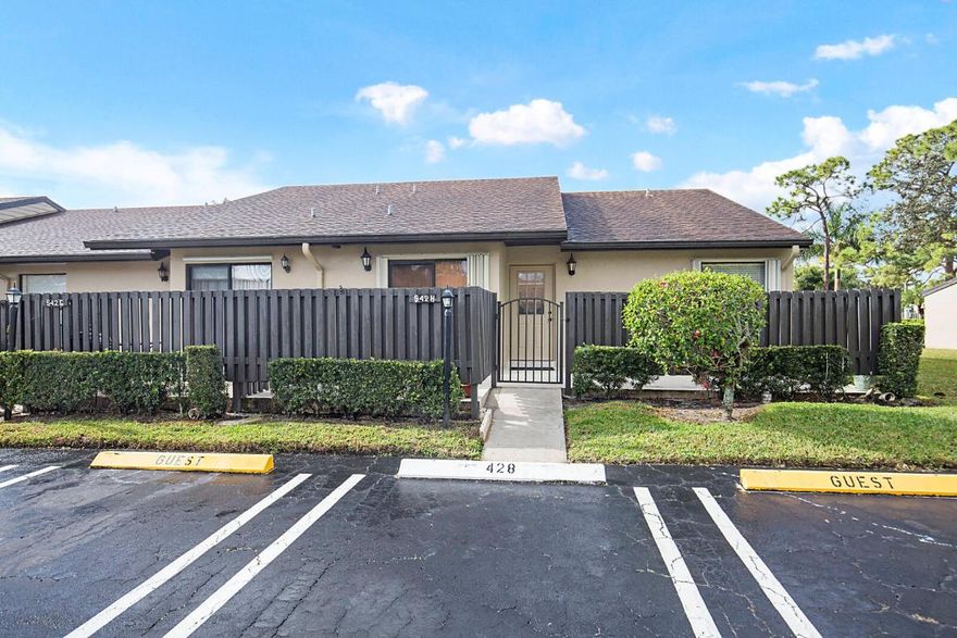 Move in Ready!! This corner unit is a 2/2 with assigned parking plus a Washer/Dryer in the home along with vaulted ceilings, new paint and tile floors throughout. Pine Ridge North  offers a community pool and several outdoor amenities for the family. This home is located next to shoppes, entertainment and restaurants.  All age community