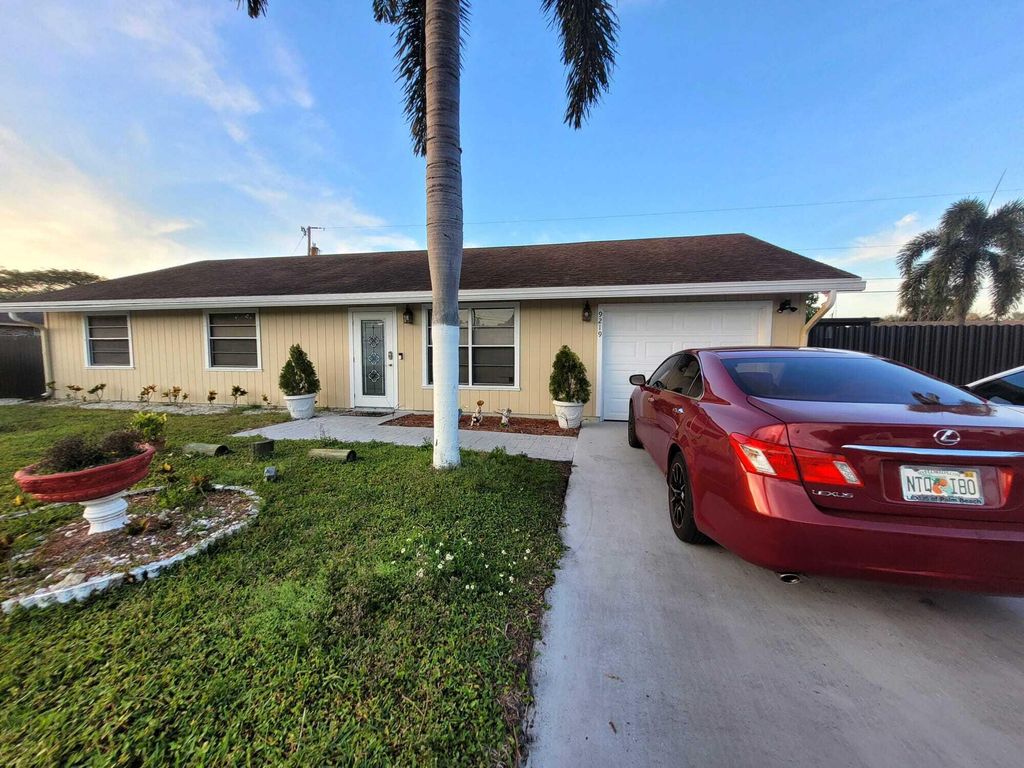 Photo of 9219 Bracelet Drive, Lake Worth, FL 33467 (MLS # R10969320)