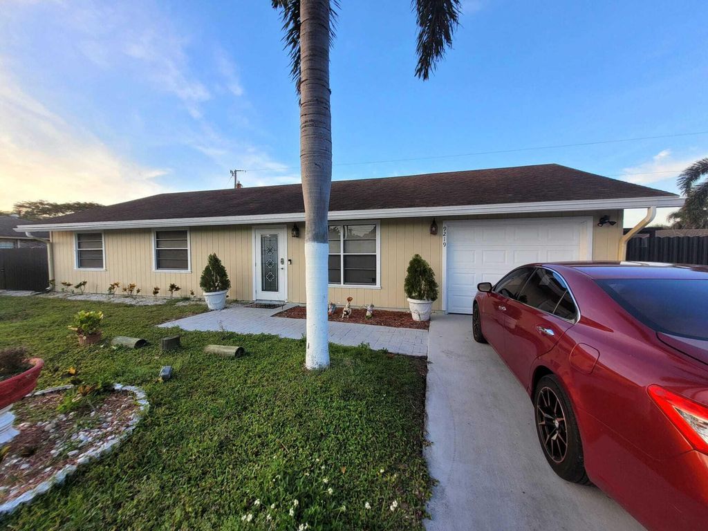 Photo of 9219 Bracelet Drive, Lake Worth, FL 33467 (MLS # R10969320)
