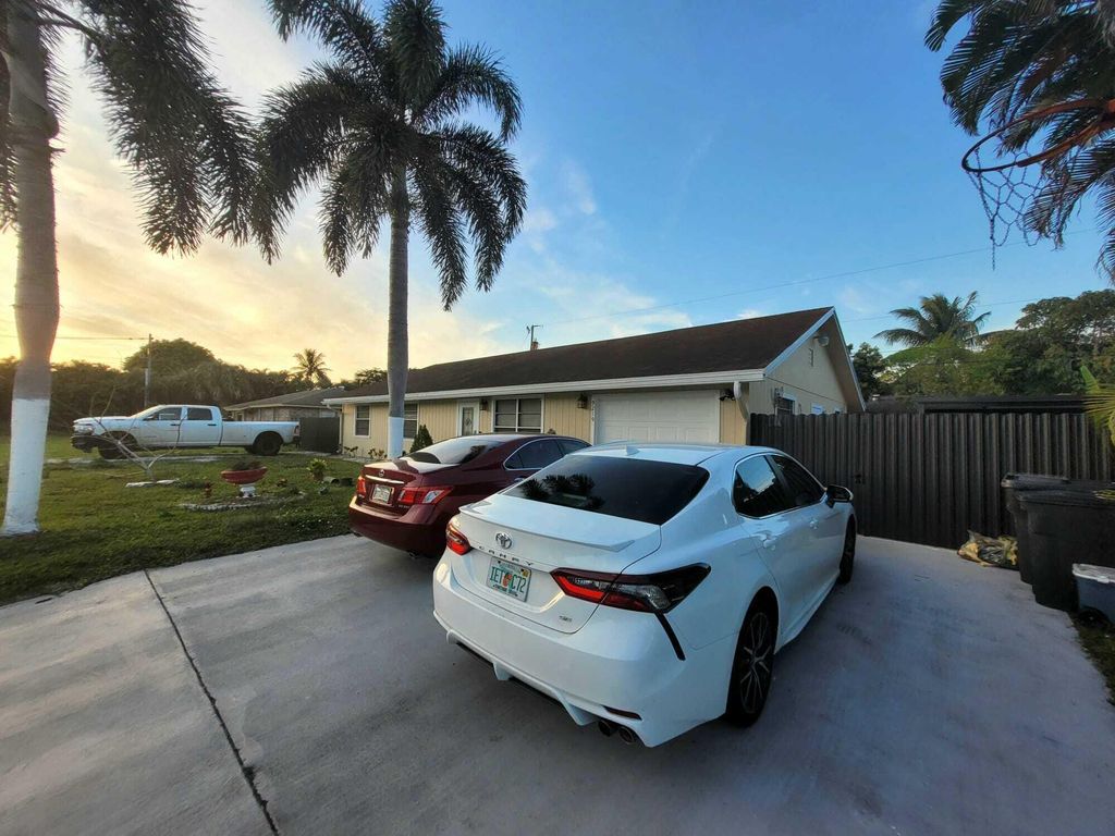 Photo of 9219 Bracelet Drive, Lake Worth, FL 33467 (MLS # R10969320)