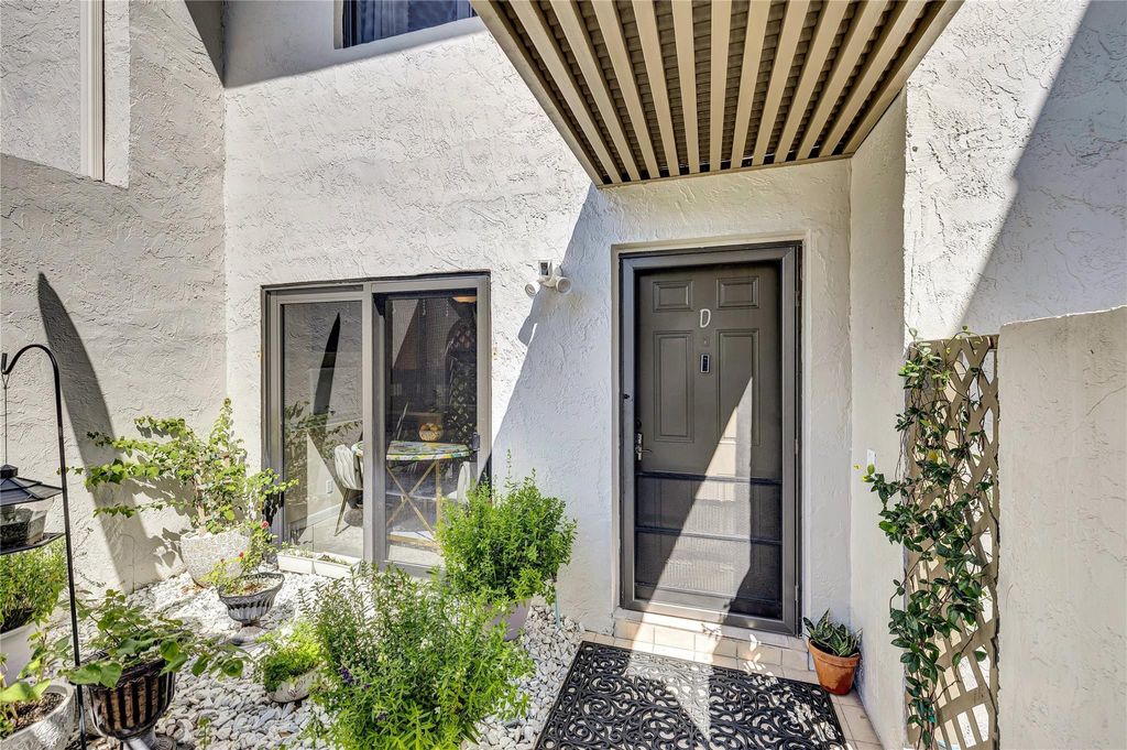 Photo of 9232 Pecky Cypress Lane #2-D, Boca Raton, FL 33428 (MLS # F10543166)