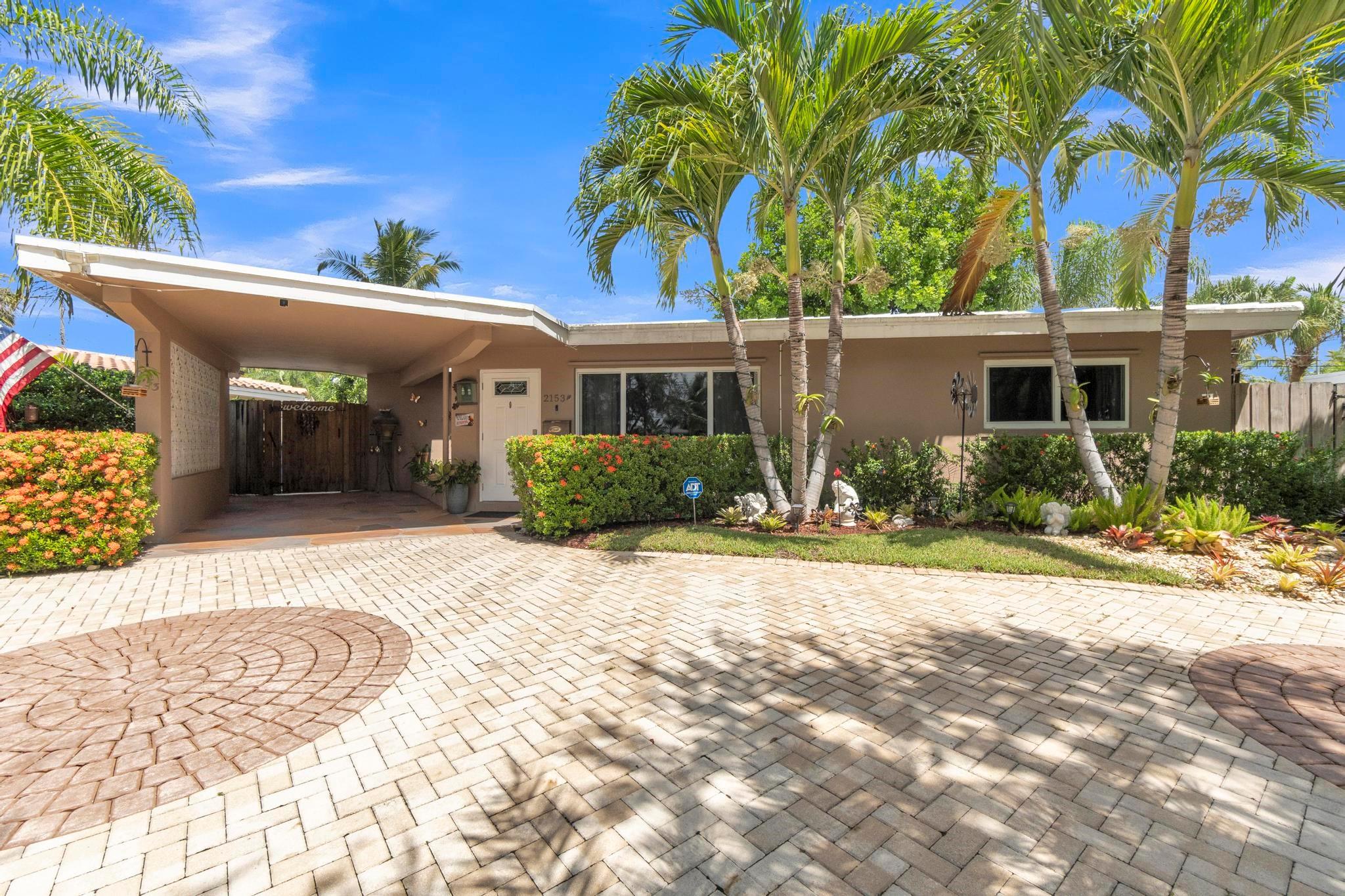 Do Not Miss the Opportunity to Live in One of Florida’s Best Locations! Centrally located in the Imperial Point community. Only minutes from the beach! This beautiful home offers an incredible lifestyle with modern upgrades and entertainment-ready features: Remodeled kitchen with premium stainless steel appliances and granite countertops, Remodeled bathrooms, Elegant porcelain floors throughout, Tankless water heater, New A/C unit (2024), Newer impact windows and doors, Newer Solar panels, Newer Private fenced patio, Sparkling pool with salt chlorination system, Outdoor gazebo with full kitchen (permitted – perfect for entertaining), Spacious circular driveway fitting up to 10 cars. Top-rated schools in the area. Great shopping and amazing dining options. schedule your appointment today.