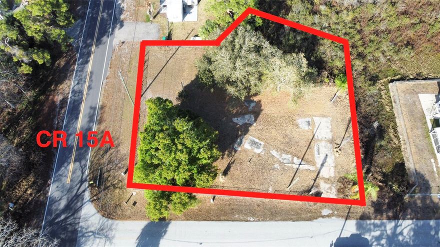 Great opportunity to own a corner acre lot ready for your mobile home or future build. This spacious property features a beautiful mature oak tree for natural shade and charm, plus septic and electric already in place, saving you time and expense. Enjoy easy access, added privacy, and plenty of room to create your ideal homesite. Bring your vision and make it yours!