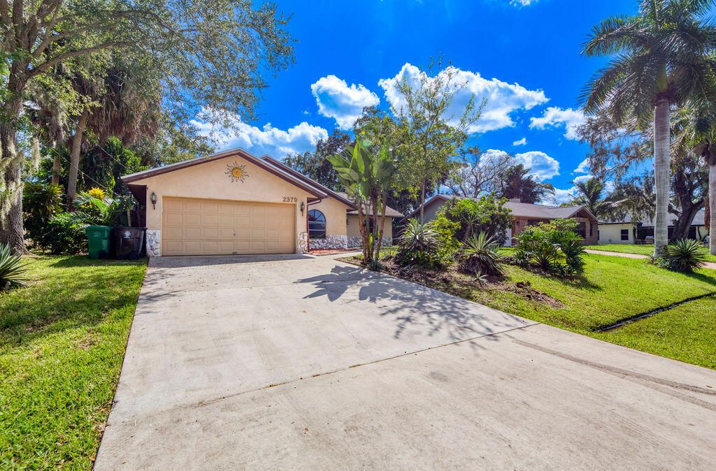 Photo of 2379 SW Valnera Street, Port Saint Lucie, FL 34953 (MLS # R11132120)