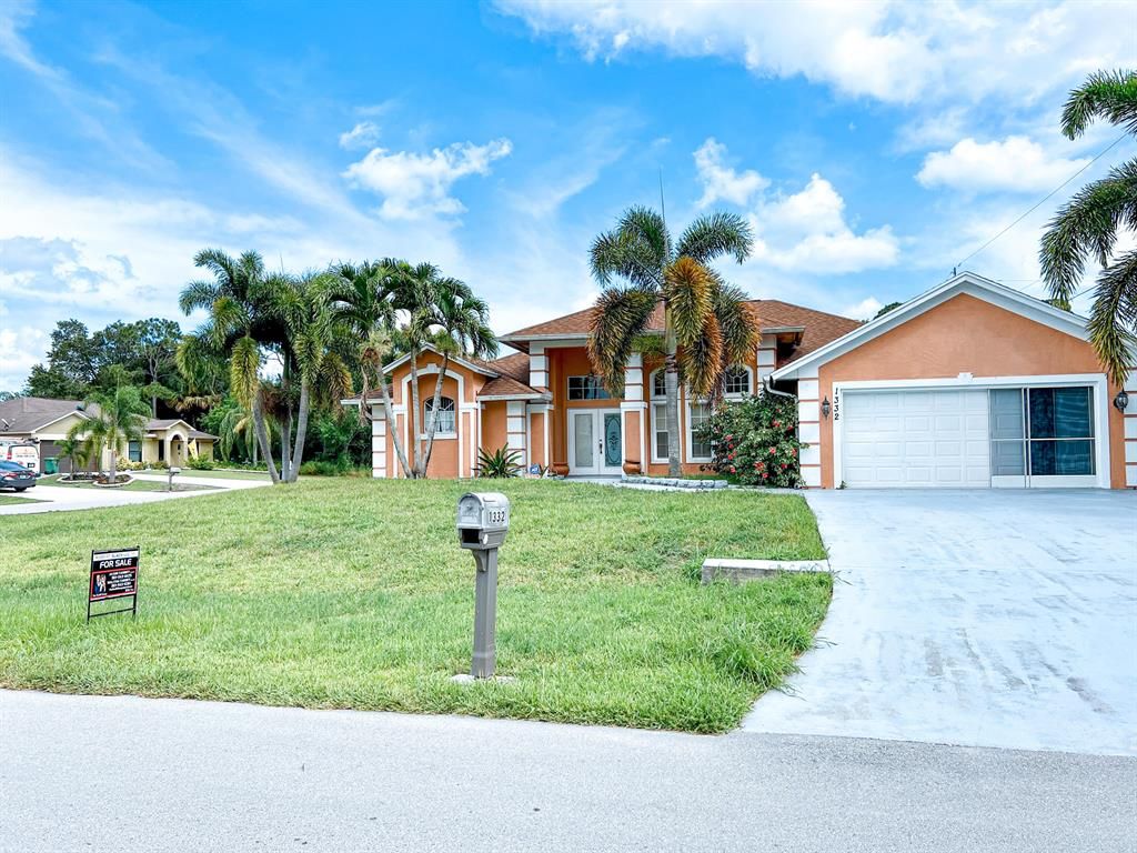 Photo of 1332 SW Ingrassina Avenue Ave, Port Saint Lucie, FL 34953 (MLS # R10813462)