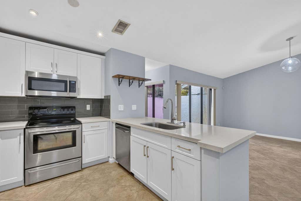 Photo of 3076 S Oakland Forest Drive #503, Oakland Park, FL 33309 (MLS # B26050690)